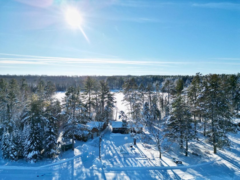 53 acres of mostly cleared land on pristine Croker Lake. The - photo 24