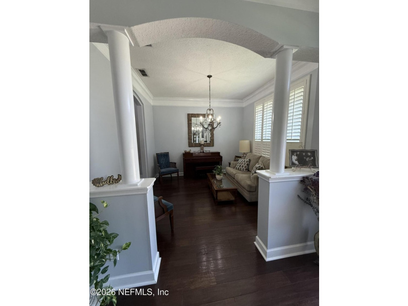 Set in a quiet, established neighborhood, this all-brick 4BR/3BA - photo 2