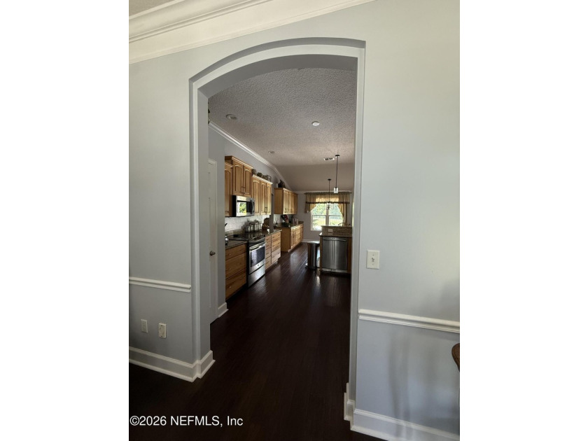 Set in a quiet, established neighborhood, this all-brick 4BR/3BA - photo 5
