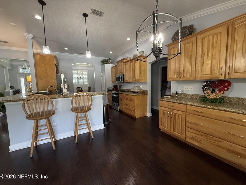 Set in a quiet, established neighborhood, this all-brick 4BR/3BA - photo 6