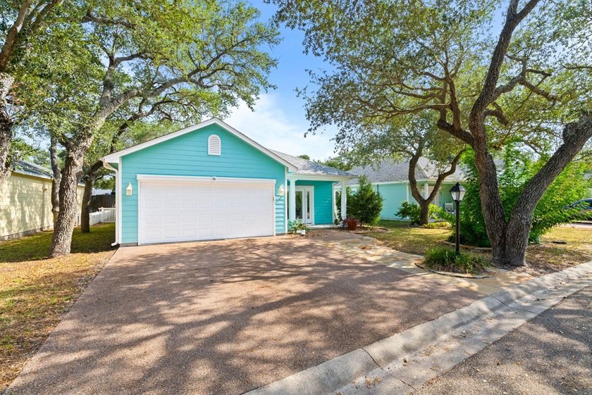 Designed with an attractive open-concept floor plan, the - photo 2