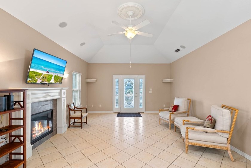 Designed with an attractive open-concept floor plan, the - photo 4