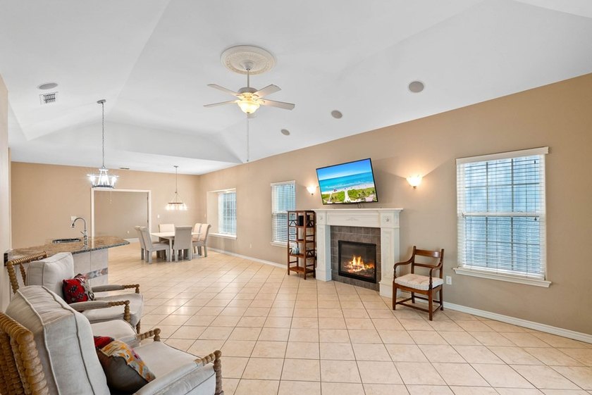 Designed with an attractive open-concept floor plan, the - photo 5
