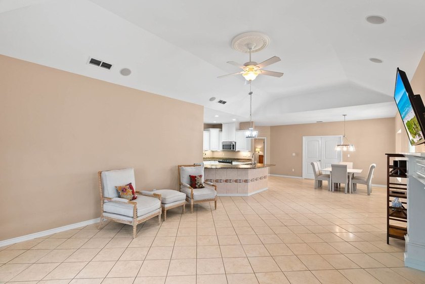 Designed with an attractive open-concept floor plan, the - photo 6