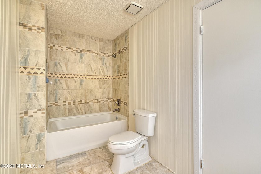 Welcome home! This 3-bedroom, 2-bathroom home offers features - photo 8