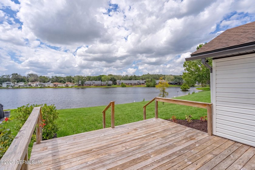 RARE LAKEFRONT OPPORTUNITY! Wake up to breathtaking water views - photo 2