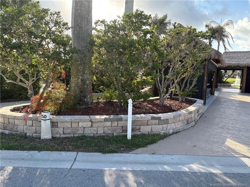 This oversized 3,717 sq. ft. waterfront lot provides an - photo 2
