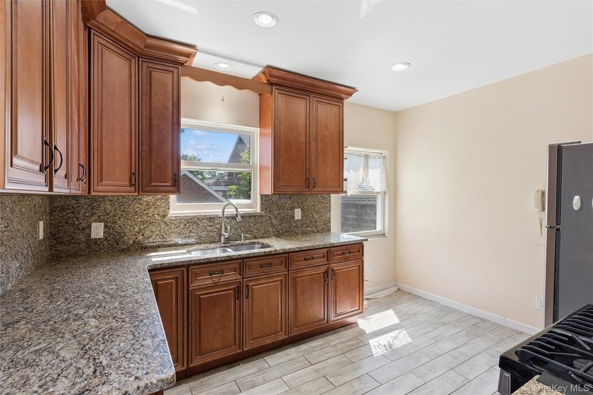 Charming All-Brick Bayside Detached Home with Endless Potential - photo 13