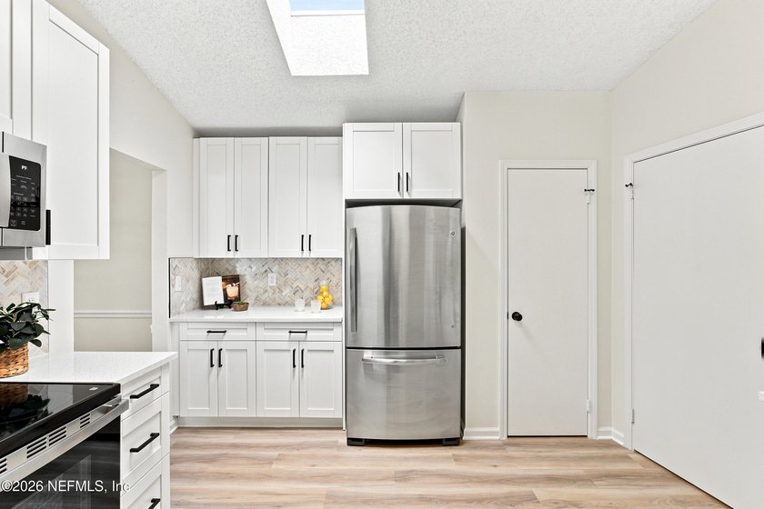 RARE LAKEFRONT OPPORTUNITY! Wake up to breathtaking water views - photo 9
