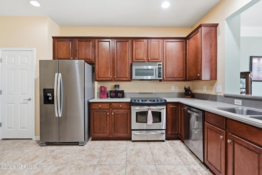 Upgraded townhome with a rare attached two-car garage, open - photo 3