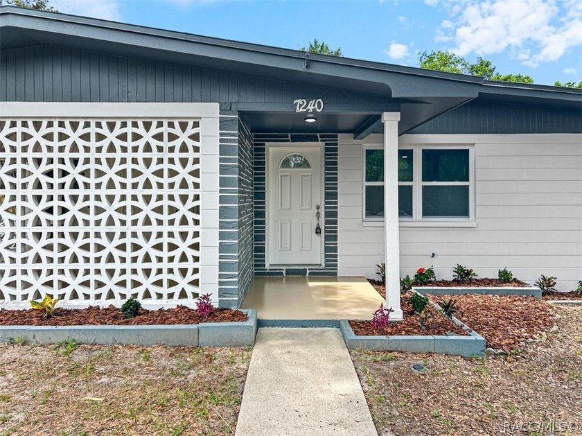 This stunning 3-bedroom, 2-bathroom home has been completely - photo 2