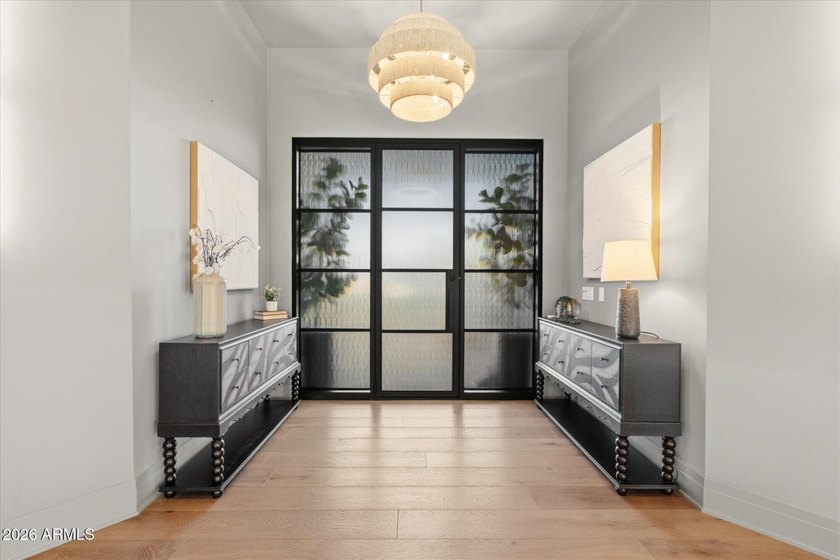 Completed in 2025, this custom home in Desert Ranch offers - photo 4