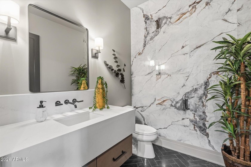 Completed in 2025, this custom home in Desert Ranch offers - photo 7