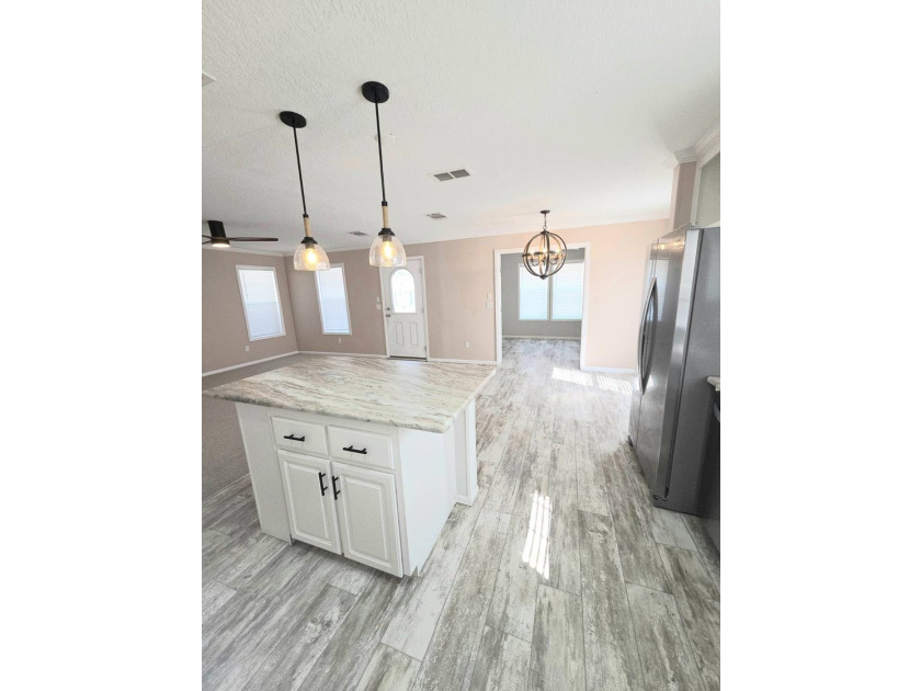 This Beautiful MOVE IN READY 2022 Jacobsen 2 Bed 2 Bath Home is - photo 8