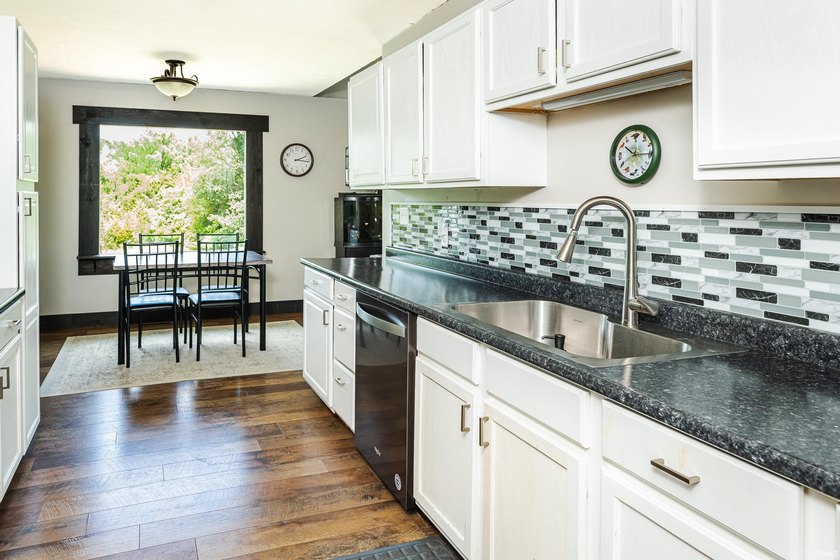 Four bedrooms, two baths, and 1,473 square feet with an open - photo 13