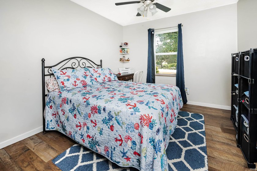Four bedrooms, two baths, and 1,473 square feet with an open - photo 22