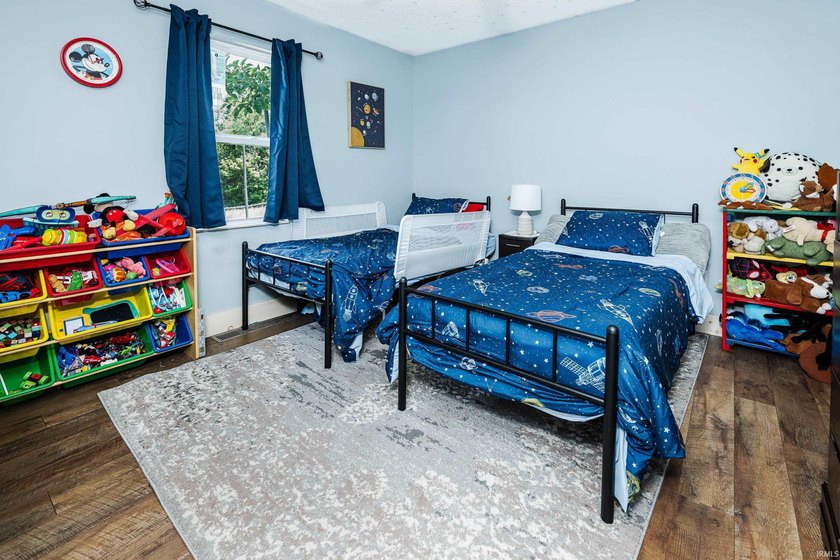 Four bedrooms, two baths, and 1,473 square feet with an open - photo 24
