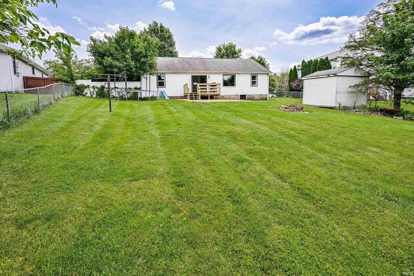 Four bedrooms, two baths, and 1,473 square feet with an open - photo 26
