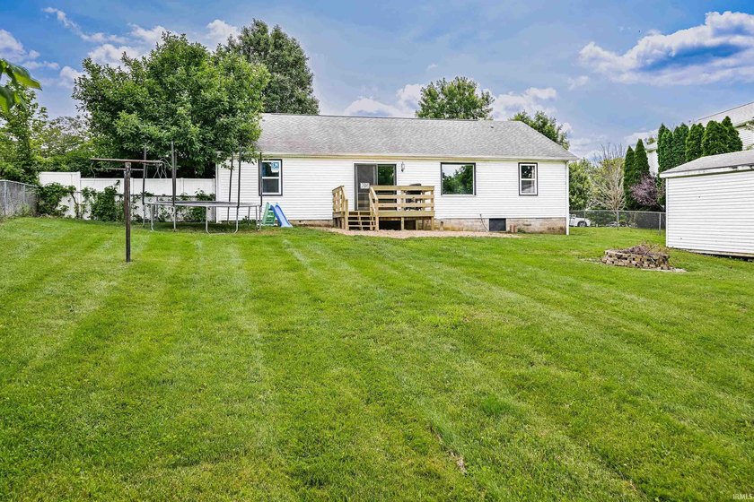 Four bedrooms, two baths, and 1,473 square feet with an open - photo 27