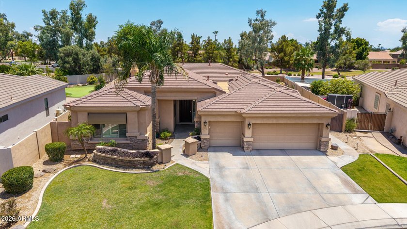 Nestled within the prestigious gated community of Catalina - photo 2