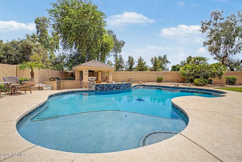Nestled within the prestigious gated community of Catalina - photo 3