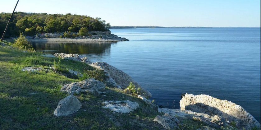 Luxury lake living at its finest! This 0.174 Acre lot in the - photo 3