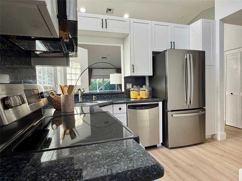 All ages Updated 2BR/2BA corner condo with the feel of a - photo 10