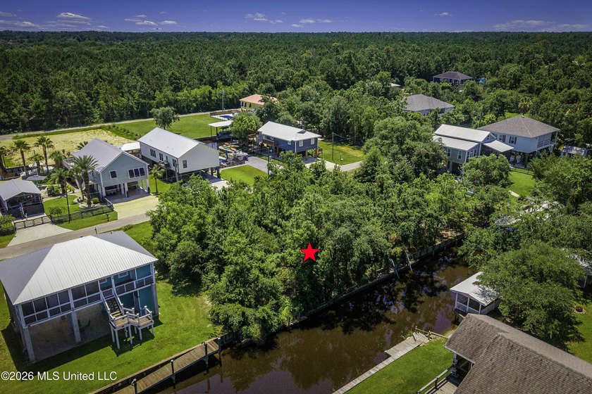 Rare waterfront opportunity in an AE flood zone with 50 feet of - photo 2