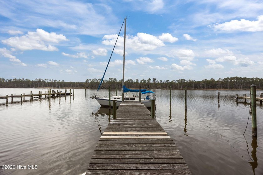 Don't miss this rare opportunity to own a waterfront home with a - photo 2