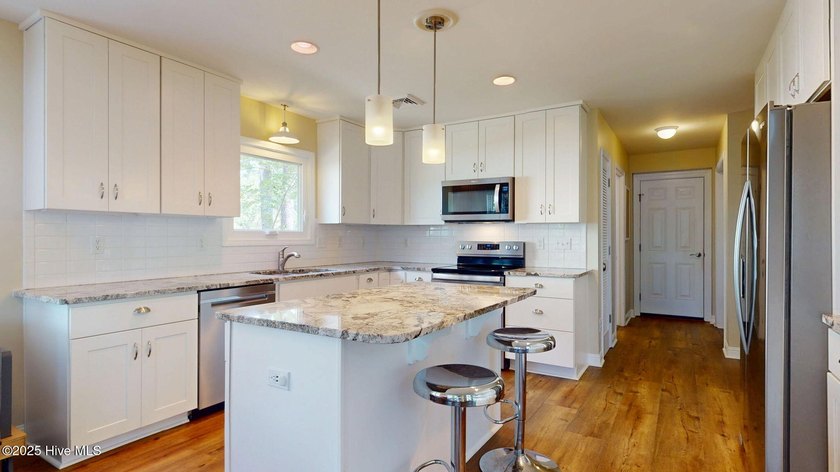 Don't miss this rare opportunity to own a waterfront home with a - photo 6