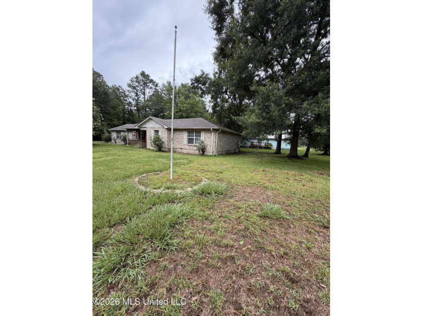 Welcome to 6173 W. Adams Street in Bay St. Louis! This spacious - photo 3