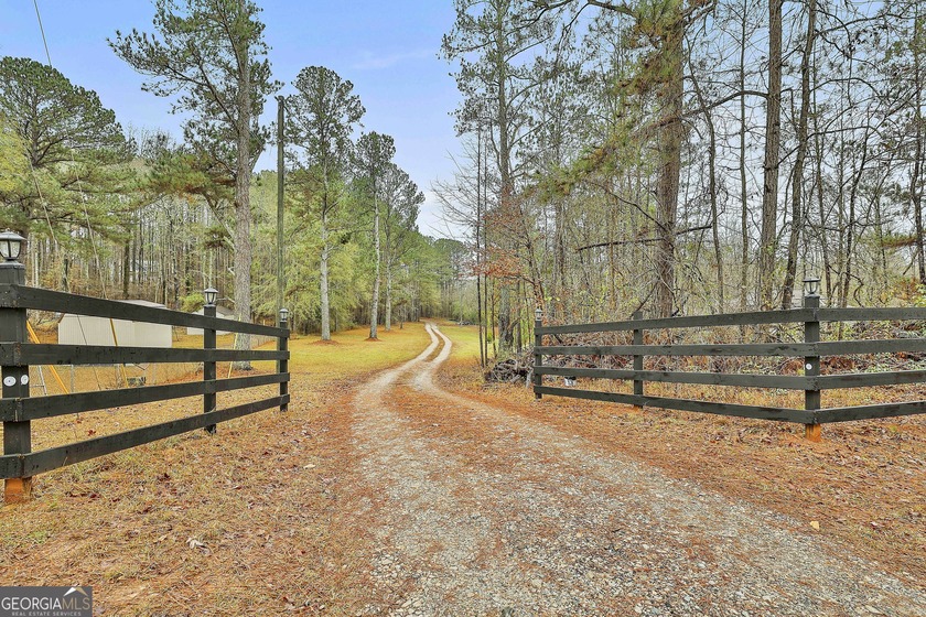 Escape the ordinary and discover serene living on over 10 acres - photo 2
