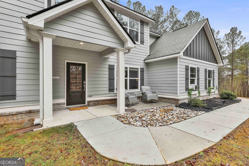 Escape the ordinary and discover serene living on over 10 acres - photo 6