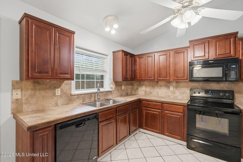 Welcome home to this spacious 4BR/2BA residence offering the - photo 5