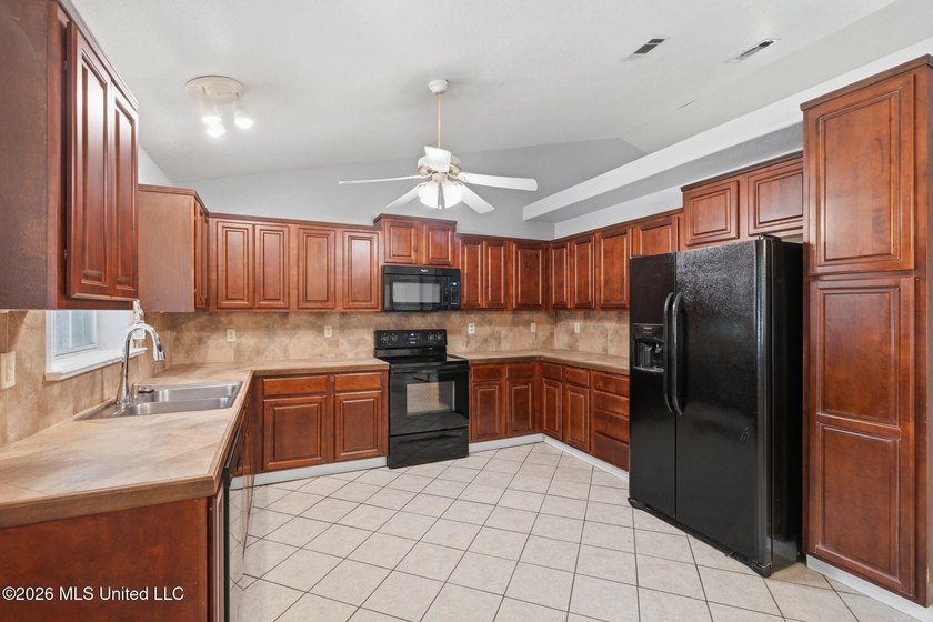 Welcome home to this spacious 4BR/2BA residence offering the - photo 6