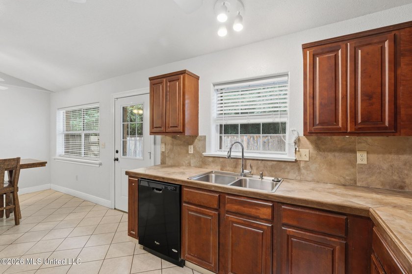 Welcome home to this spacious 4BR/2BA residence offering the - photo 7