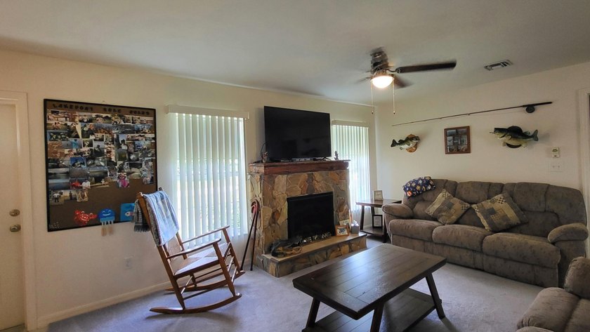 This marvelous custom-built CBS pristine, furnished home on .27 - photo 11