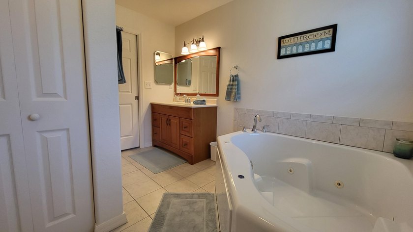 This marvelous custom-built CBS pristine, furnished home on .27 - photo 32