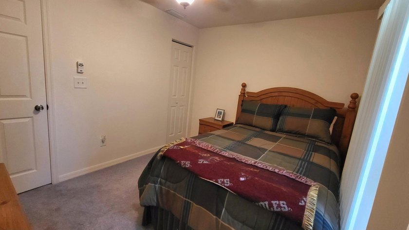 This marvelous custom-built CBS pristine, furnished home on .27 - photo 35