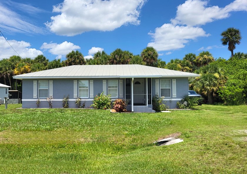 This marvelous custom-built CBS pristine, furnished home on .27 - photo 44