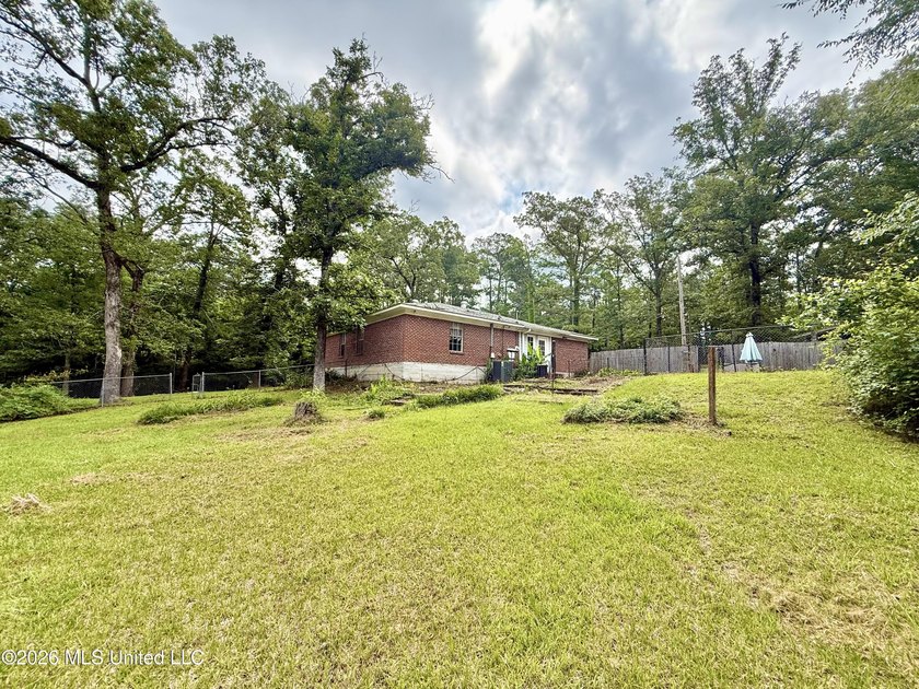 Enjoy peaceful country living on 5.4+/- acres with this spacious - photo 8