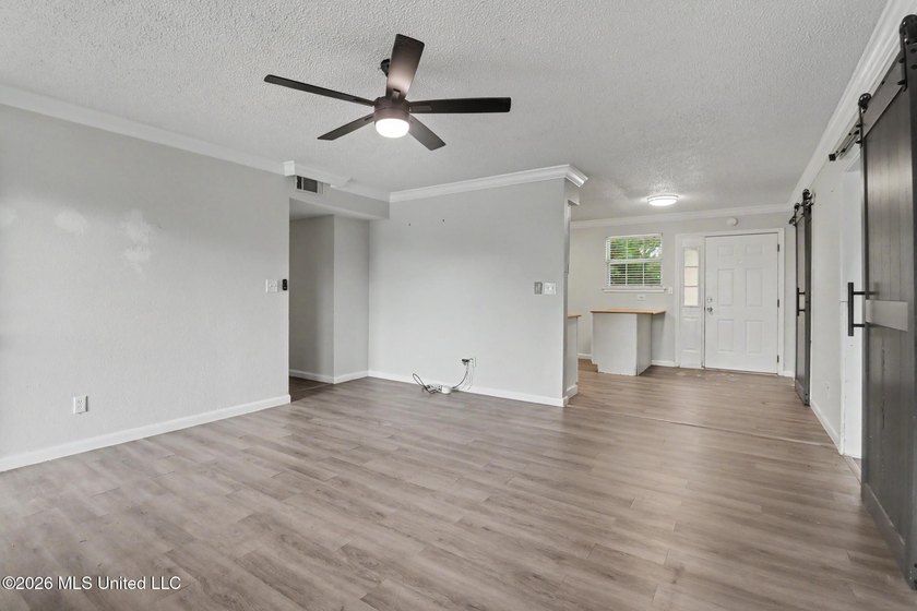 Welcome to this charming 3-bedroom, 2-bath brick home located in - photo 3