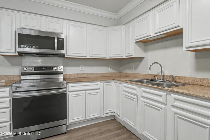 Welcome to this charming 3-bedroom, 2-bath brick home located in - photo 5