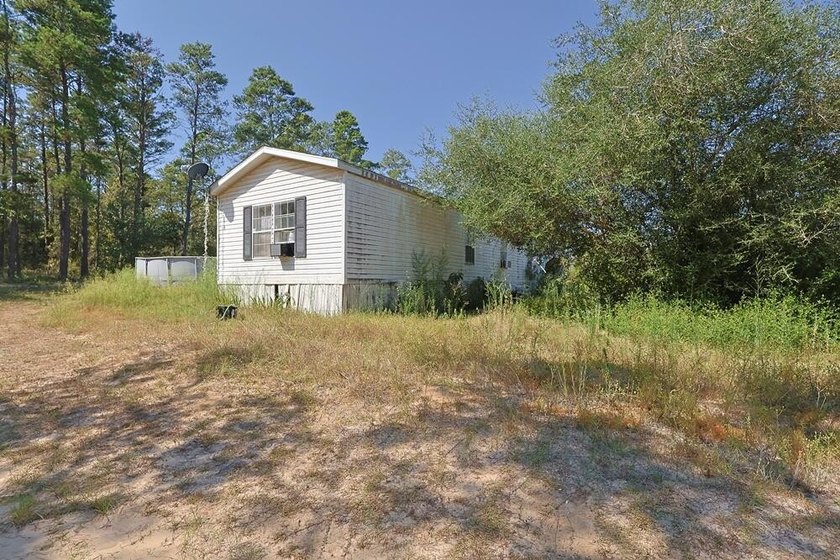 Freeport 5-acre parcel with 3BR/2BA mobile home (2000). Wooded - photo 18