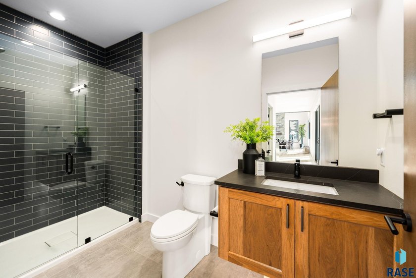 Welcome to this stunning modern riverfront retreat, where luxury - photo 15