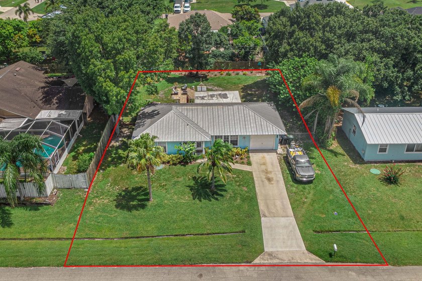 SHORT SALE BACK ON THE MARKET! Nestled in a quiet and desirable - photo 2