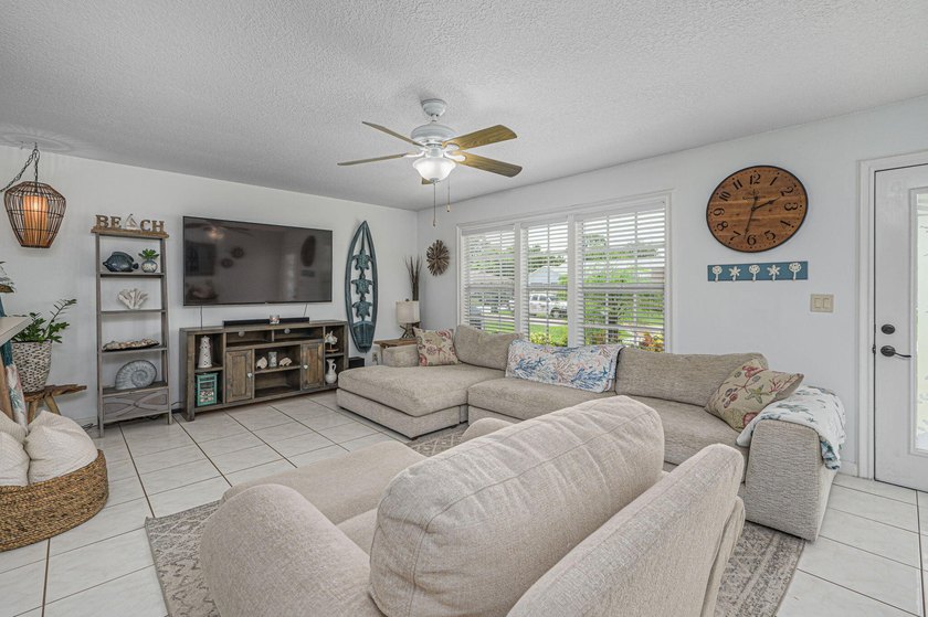 SHORT SALE BACK ON THE MARKET! Nestled in a quiet and desirable - photo 3