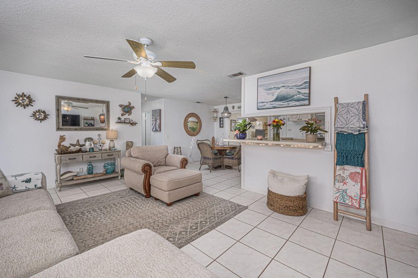 SHORT SALE BACK ON THE MARKET! Nestled in a quiet and desirable - photo 4