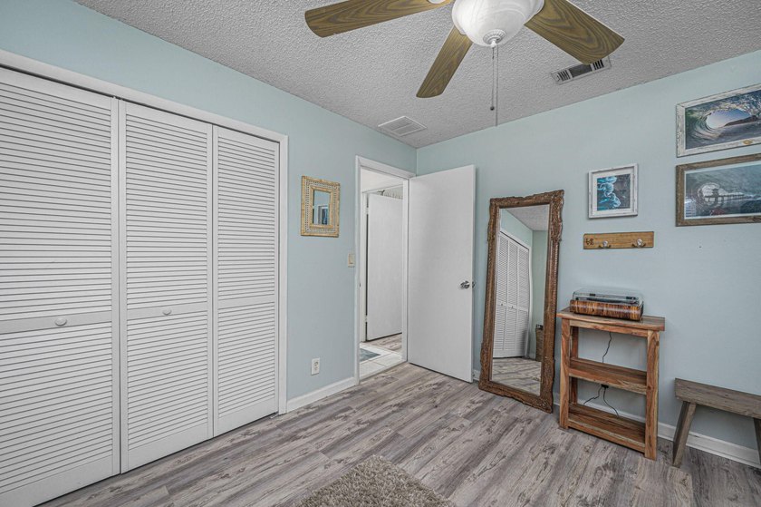 SHORT SALE BACK ON THE MARKET! Nestled in a quiet and desirable - photo 6