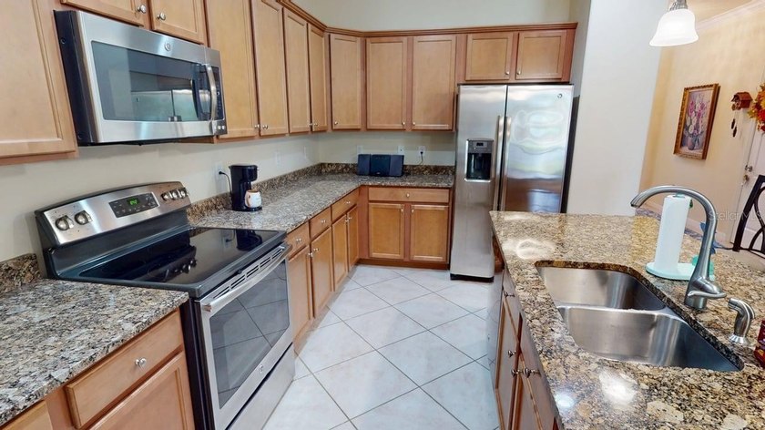 Virtually Staged. Welcome to Bella Vida, one of the safest gated - photo 11